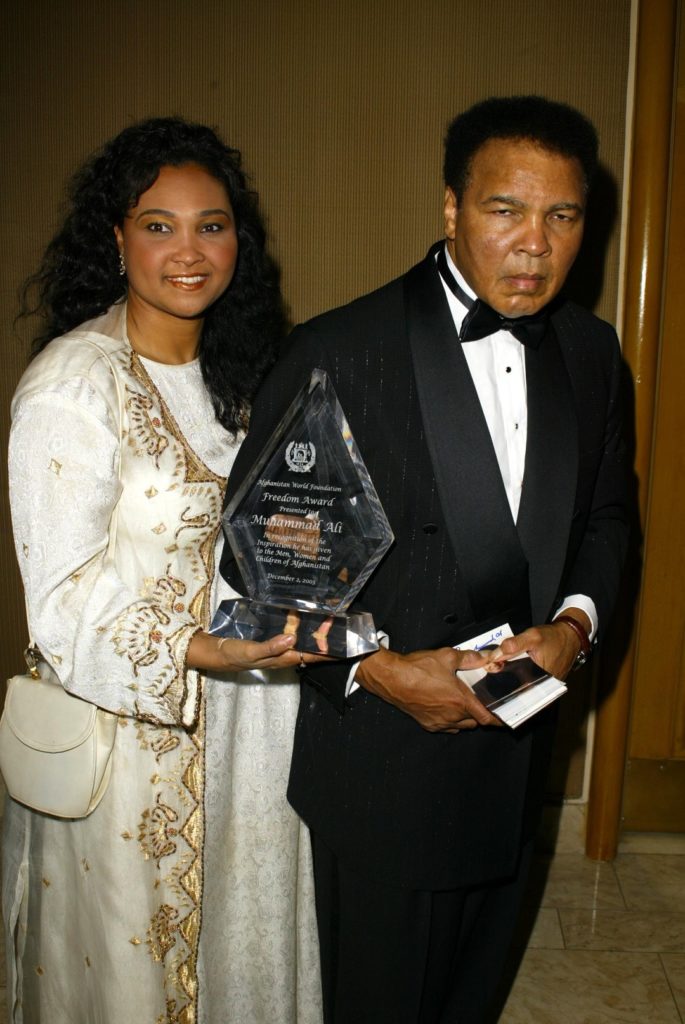 Muhammad Ali and daughter May May at the Time To Give Gala benefitting the Afghanistan World Federation Foundation, St. Regis Hotel, Century City, CA 12-02-03